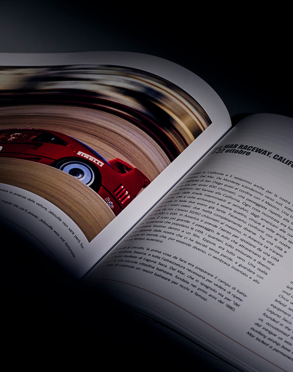 Book page with Ferrari F40 in motion and text about Del Mar Raceway, California